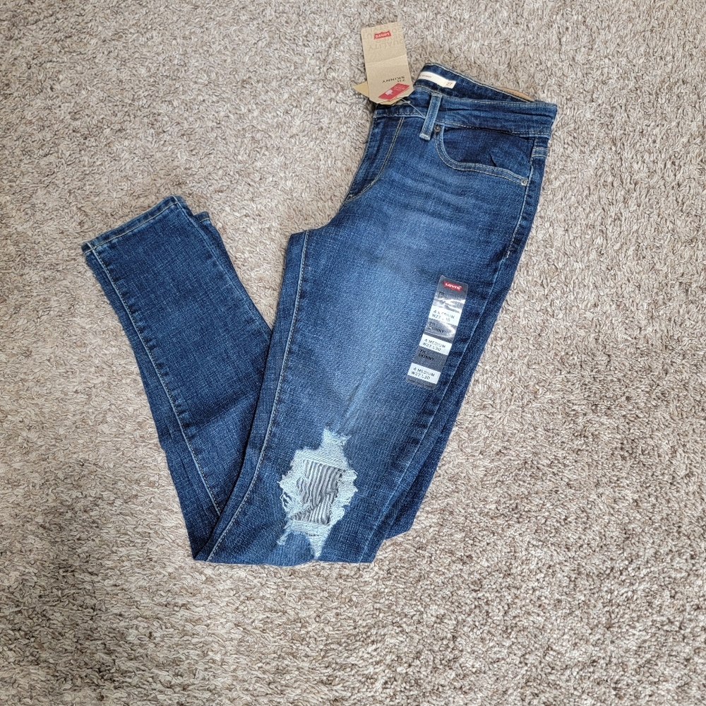 LEVIS * NWT * 711 Skinny w/ holes * Dark jean Size 4
